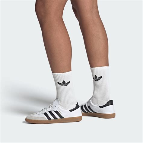 white adidas samba men.